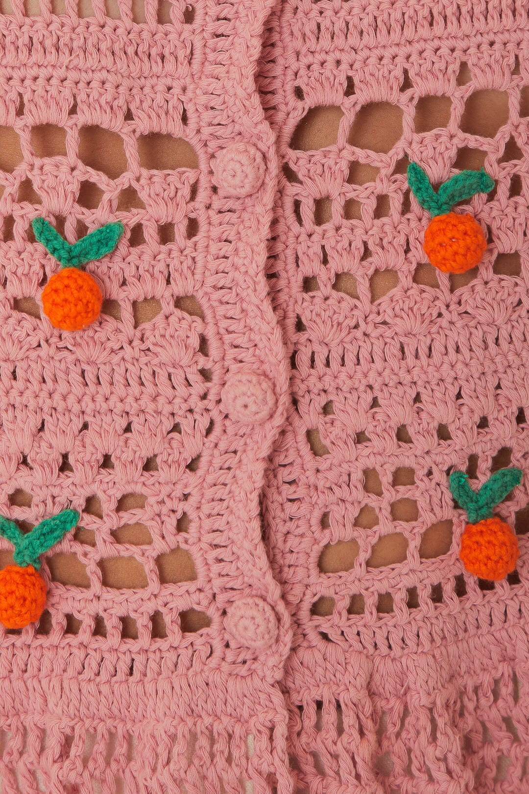 Blouse au crochet à pampilles rose orange