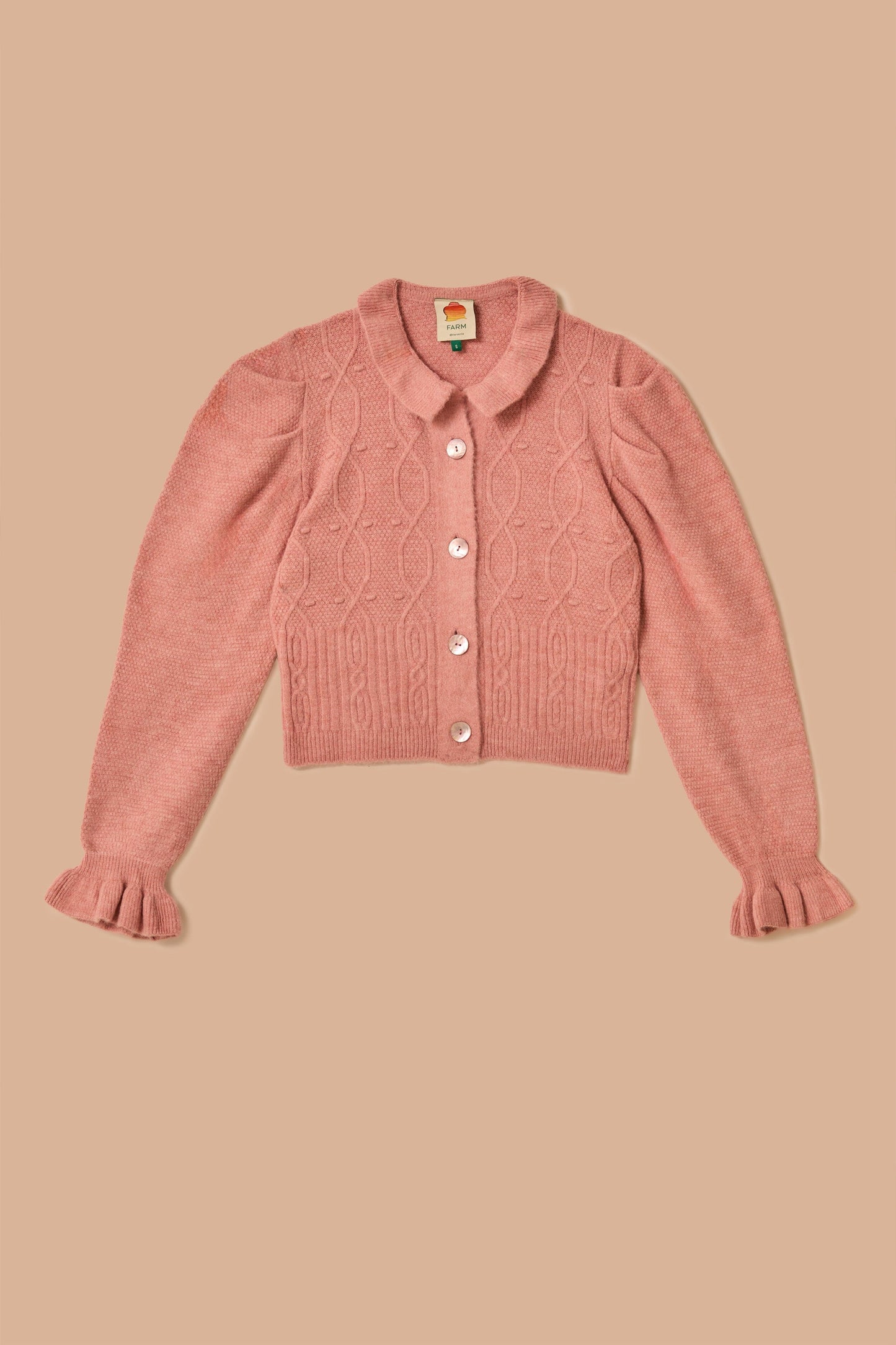 Cardigan en tricot à volants rose clair