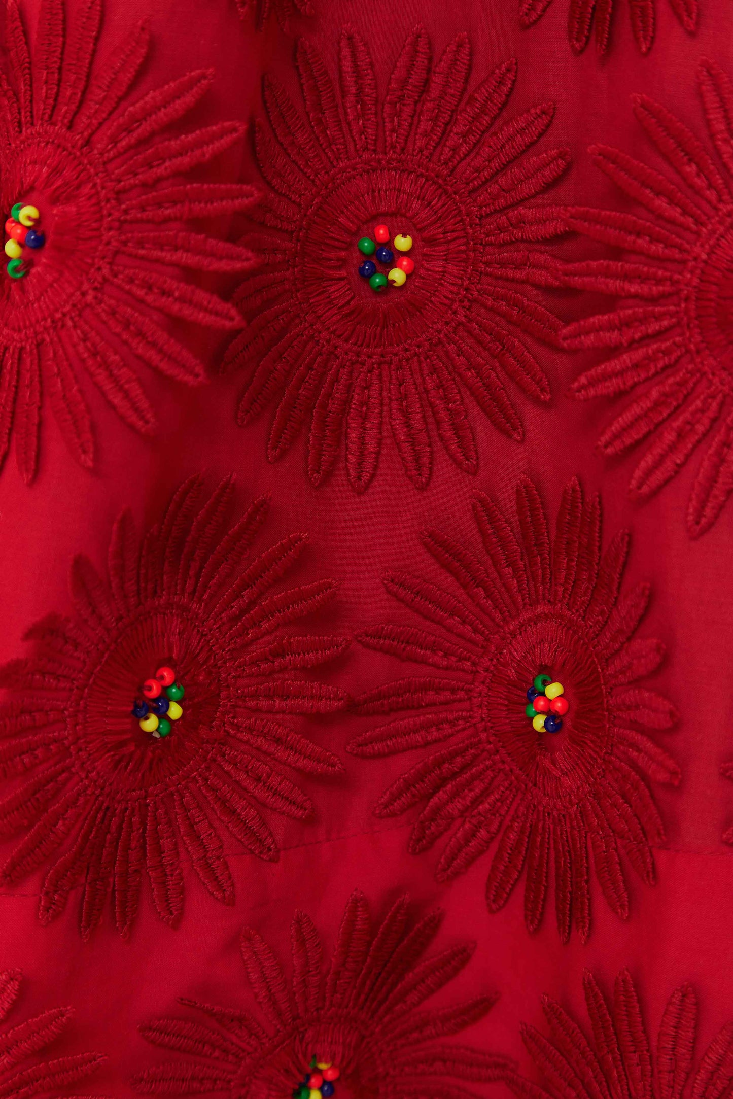 Jupe midi rouge à fleurs de marguerite