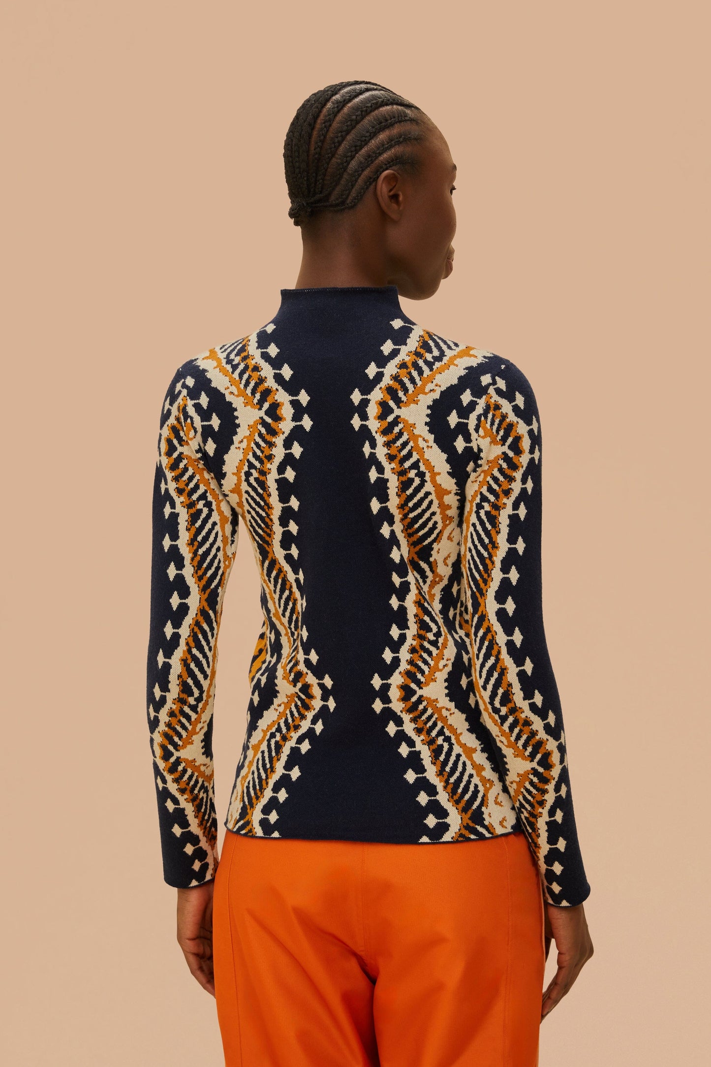 Haut en tricot à manches longues et rayures noires en ikat