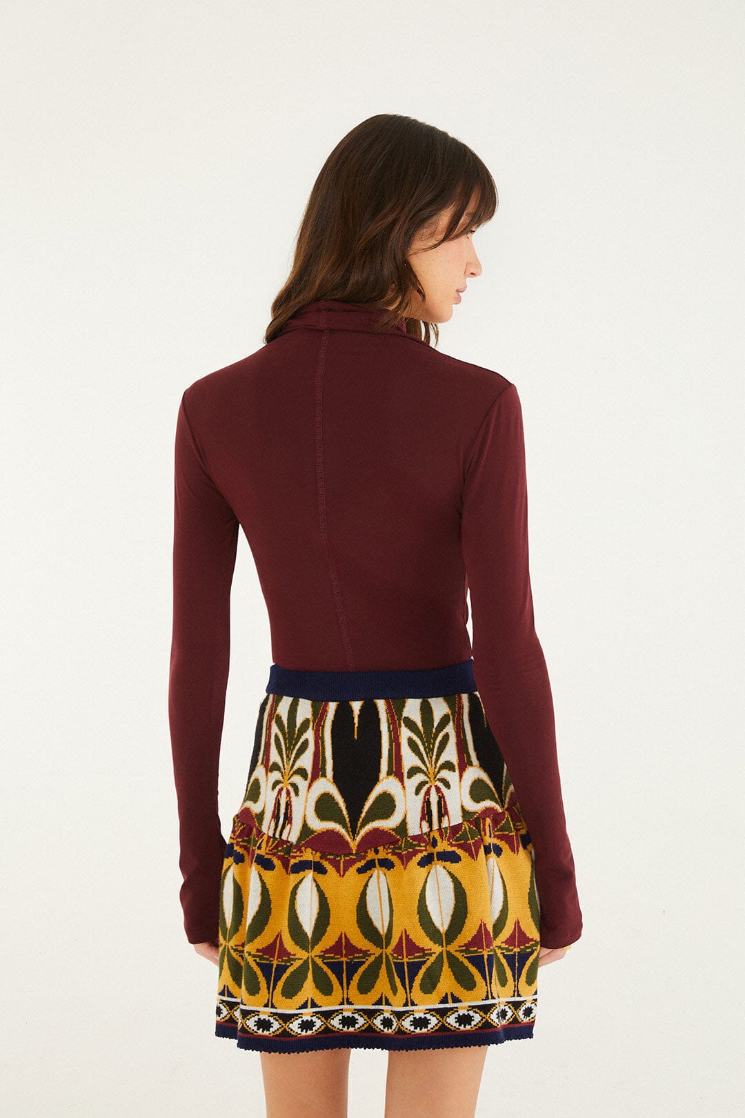 FARM Rio model wearing the Ainika Pietra Dura Knit Skirt