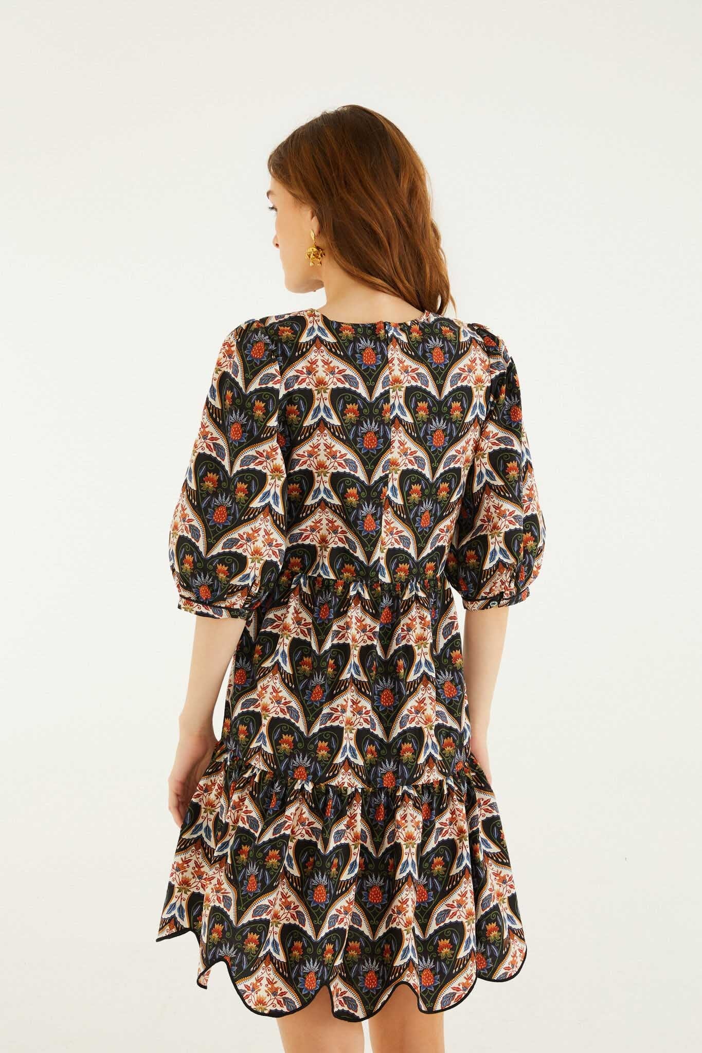 FARM Rio model wearing the Black Porcelain Birds Puff Sleeve Mini Dress
