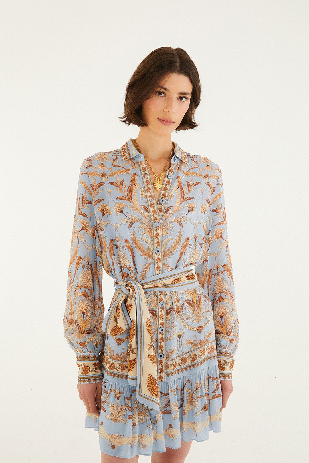 FARM Rio model wearing the Blooming Garden Long Sleeve Mini Dress