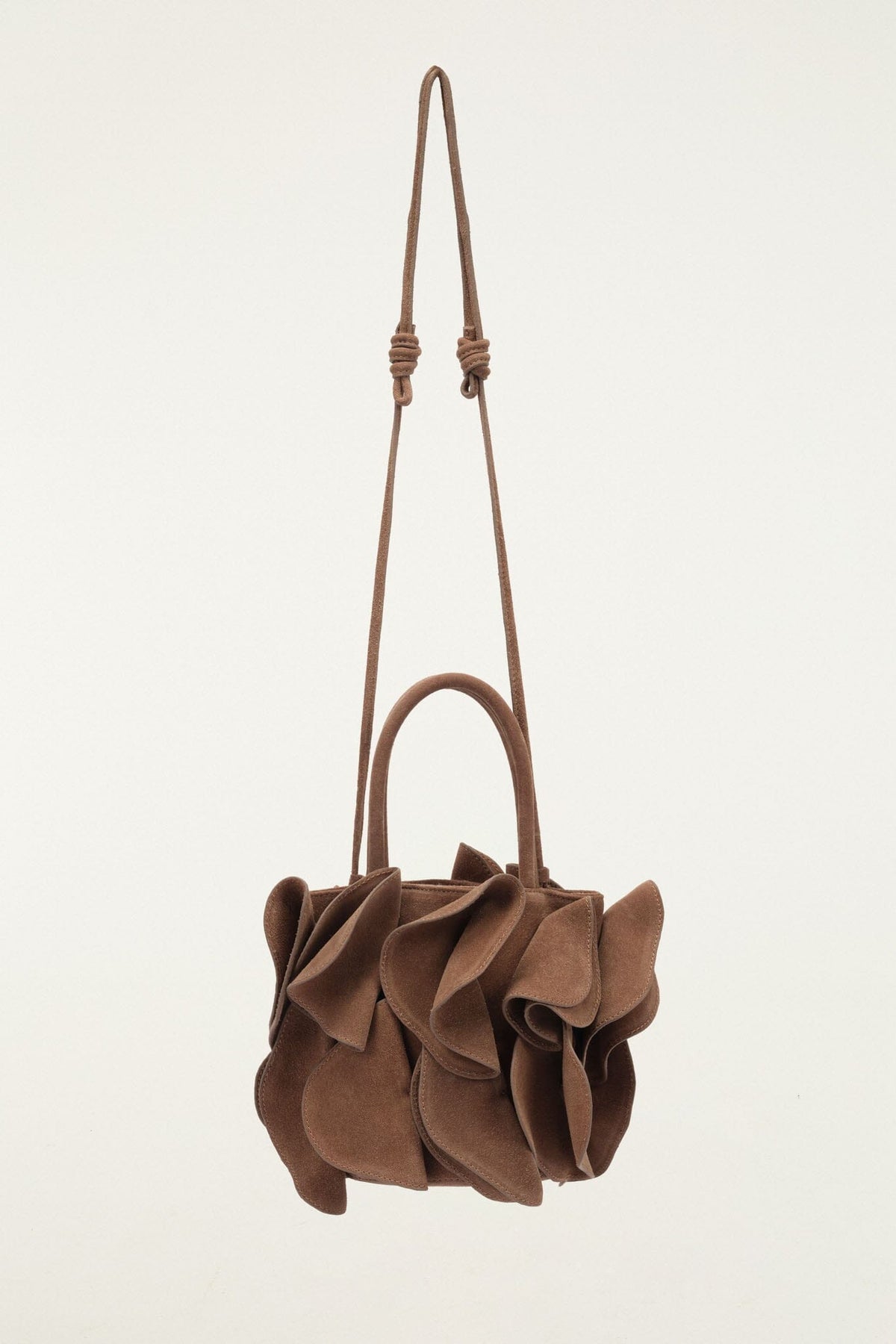 Bolso de ante con flor marrón