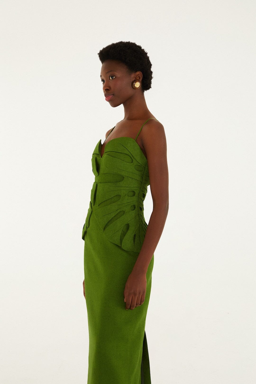 FARM Rio model wearing the Green Monstera Leaf Sleeveless Euroflax Premium Linen Maxi Dress
