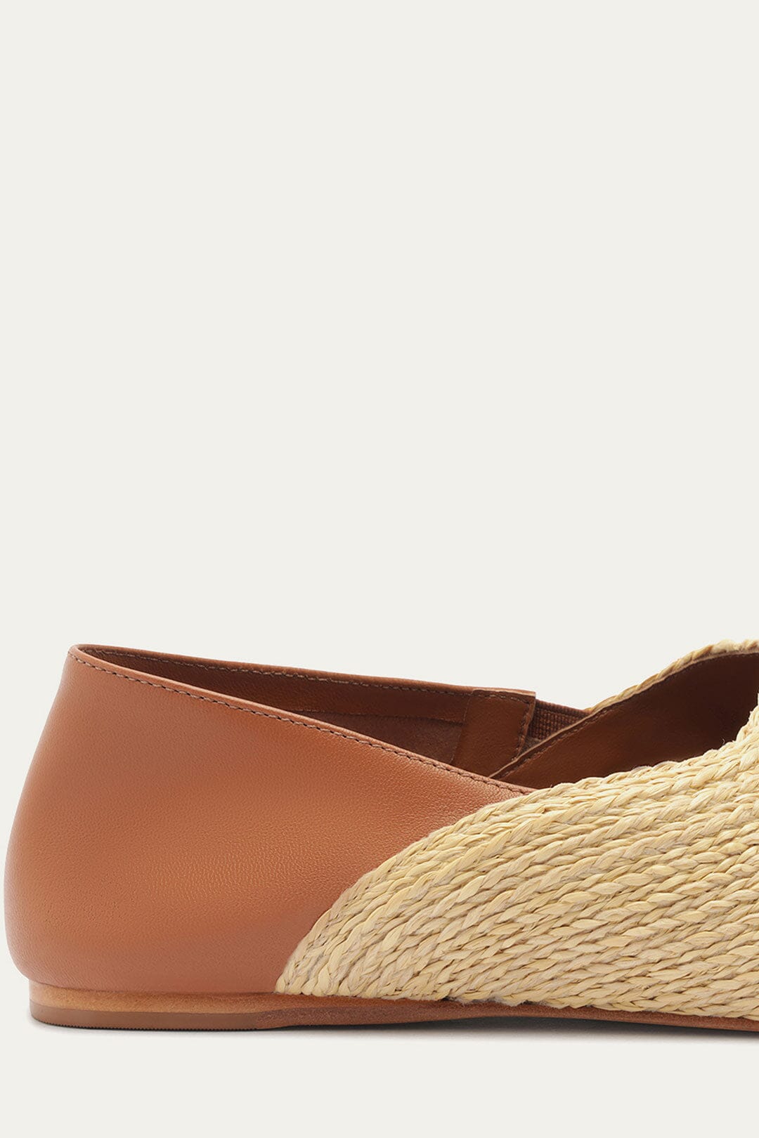 FARM Rio model wearing the Raffia Flat Loafer
