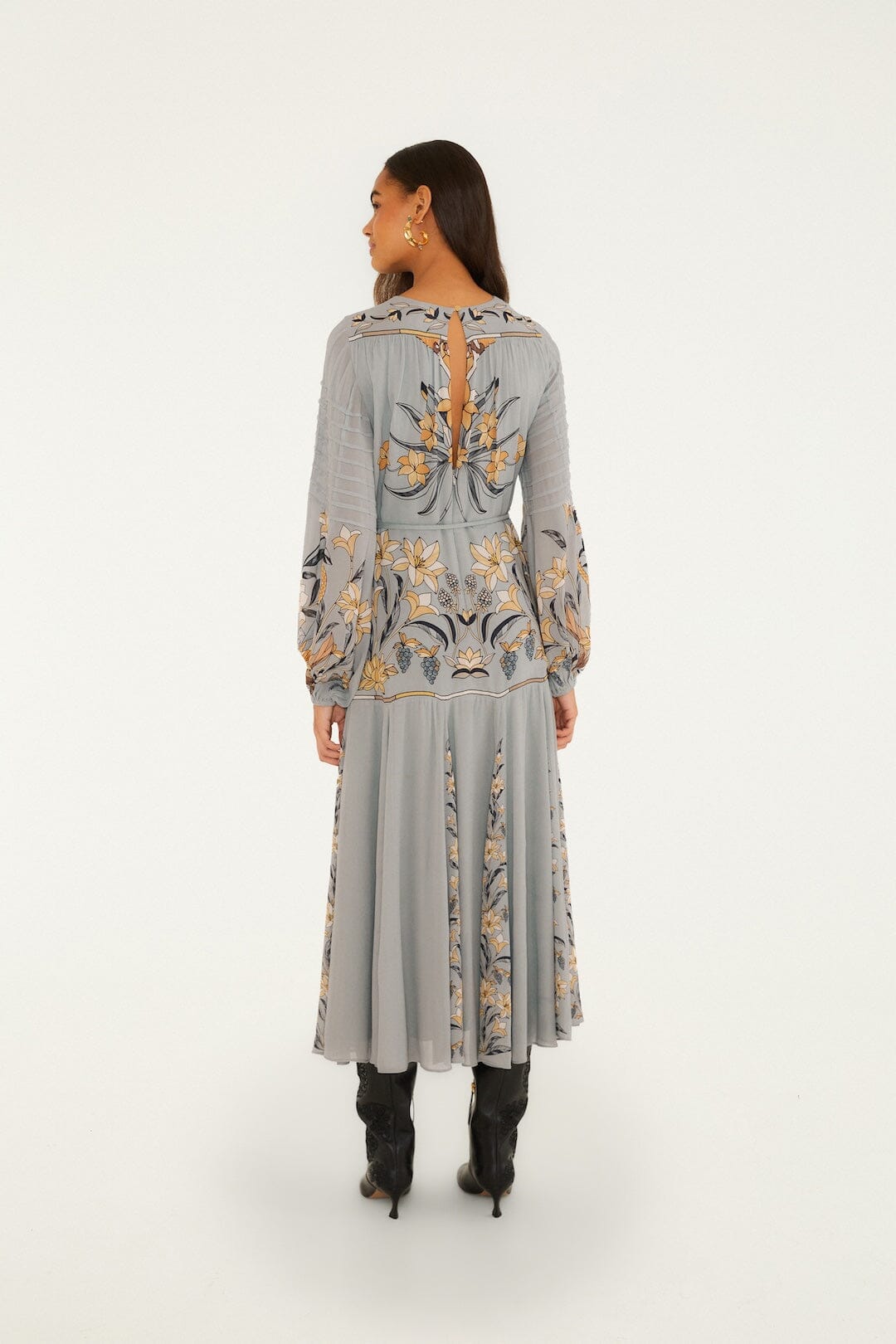 FARM Rio model wearing the Stained Glass Beauty Long Sleeve Pleated Maxi Dress