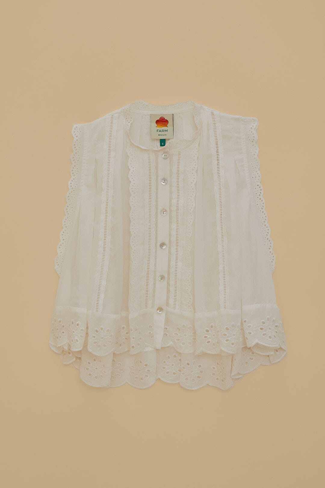 Off-White Sleeveless Blouse