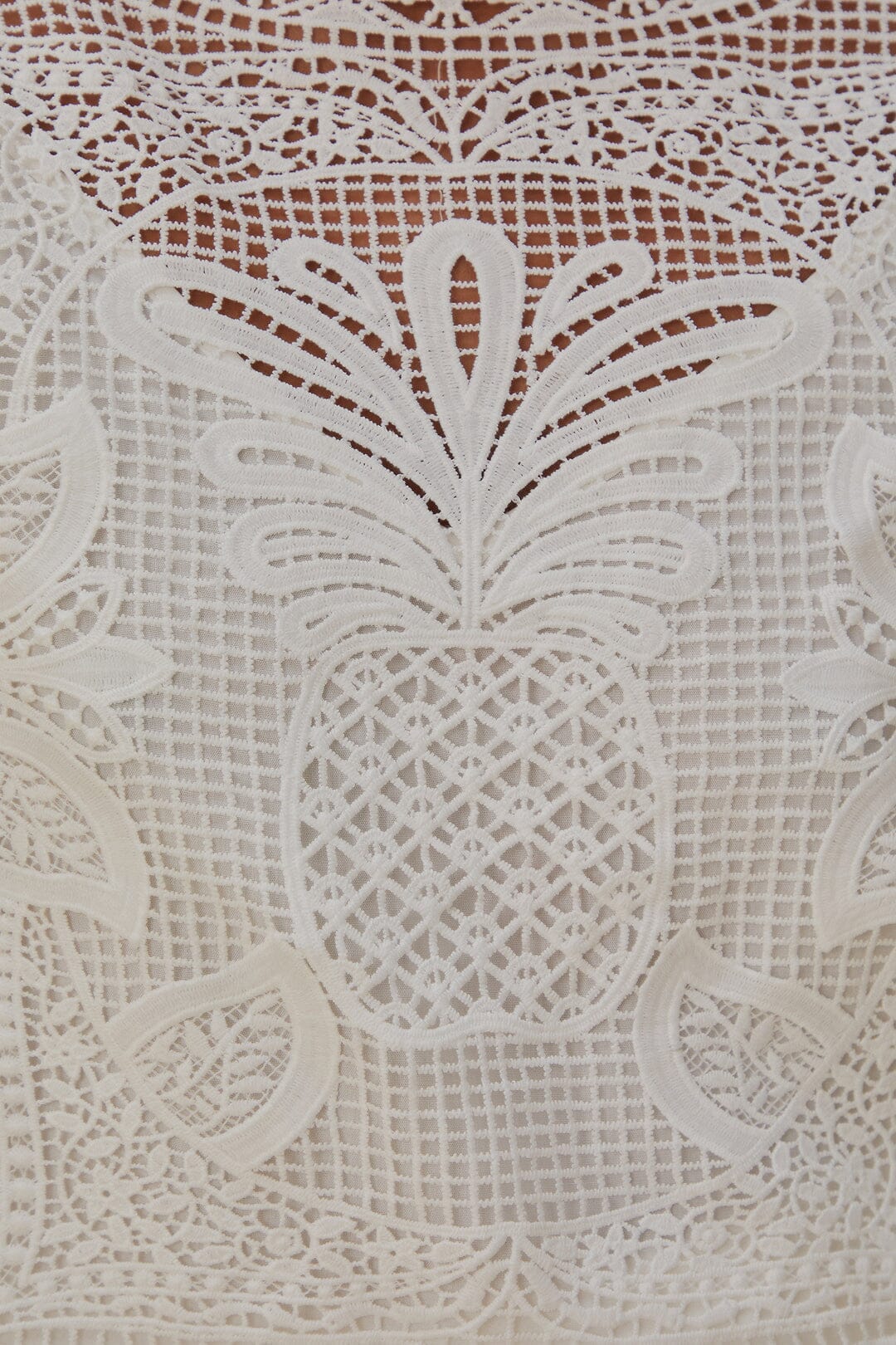 Blouse blanche à manches courtes en guipure