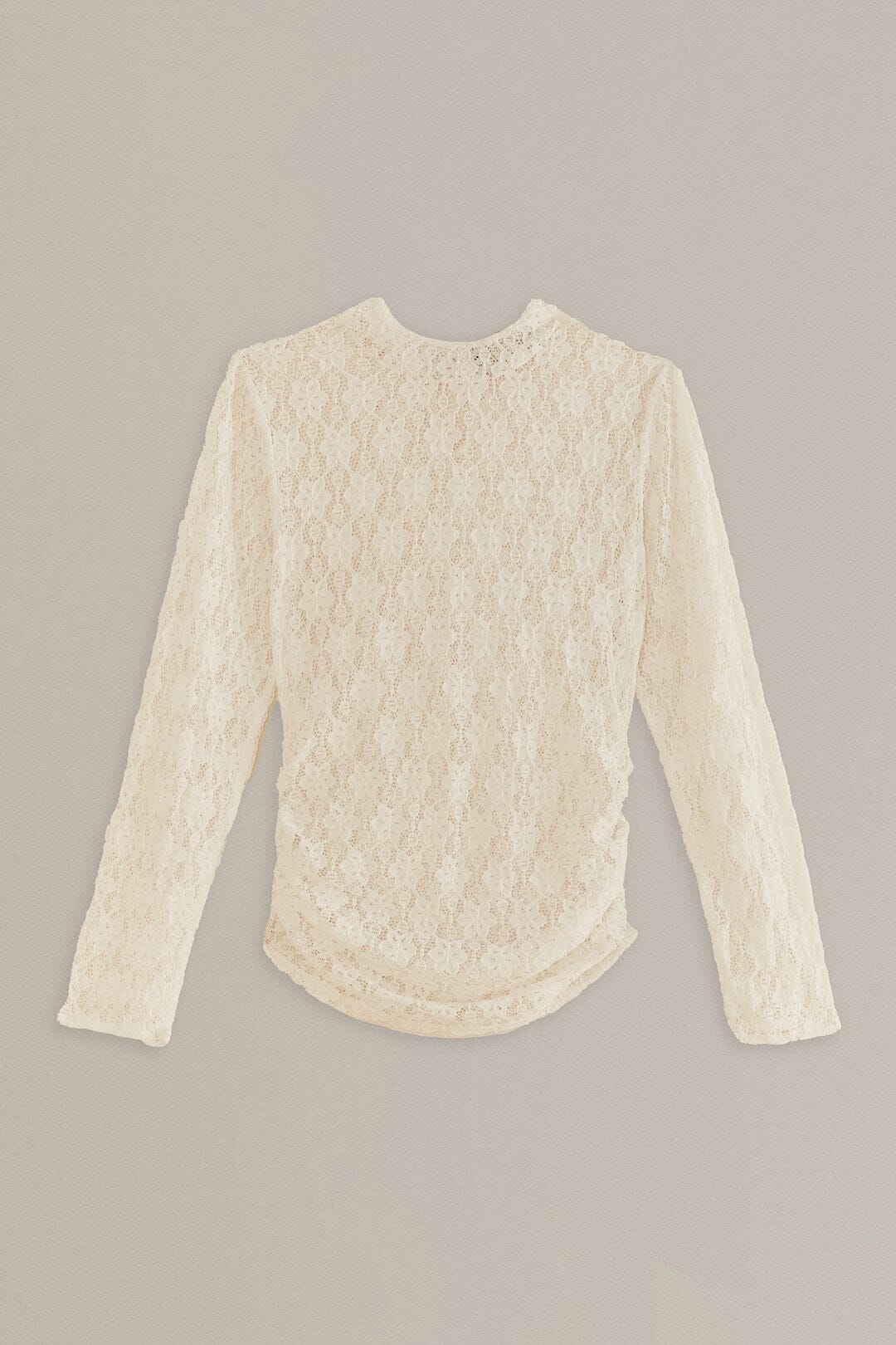 Chemisier blanc à manches longues en dentelle