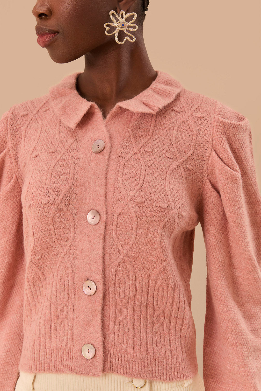 Cardigan en tricot à volants rose clair