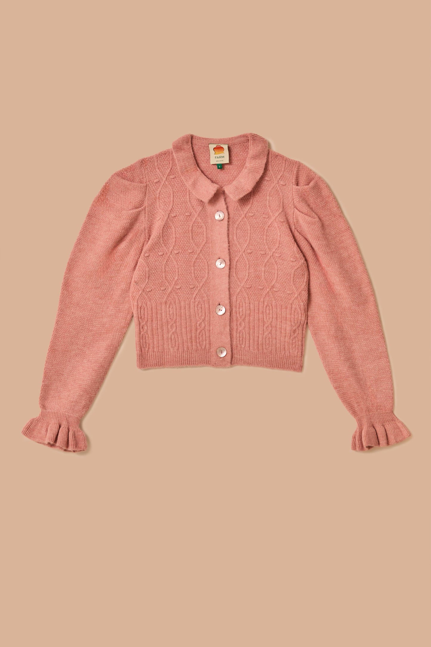 Cardigan en tricot à volants rose clair