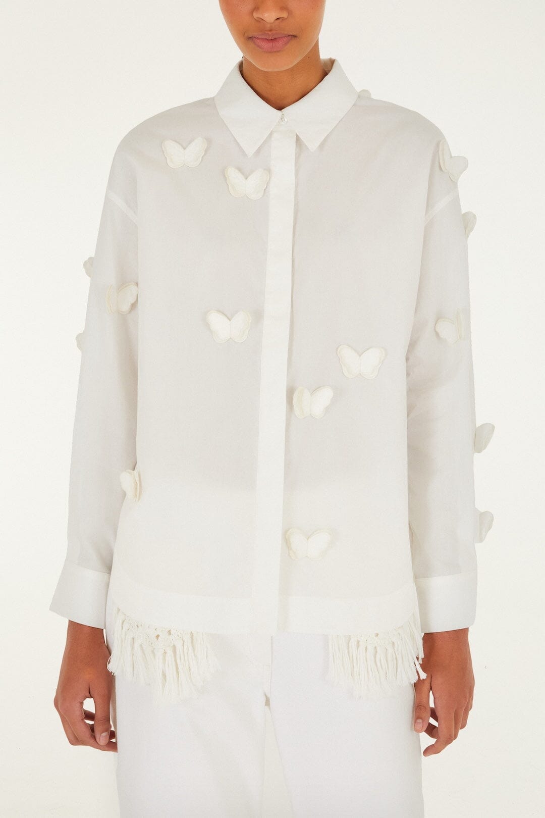 BLUSE MIT SCHMETTERLINGSMUSTER IN OFF-WHITE