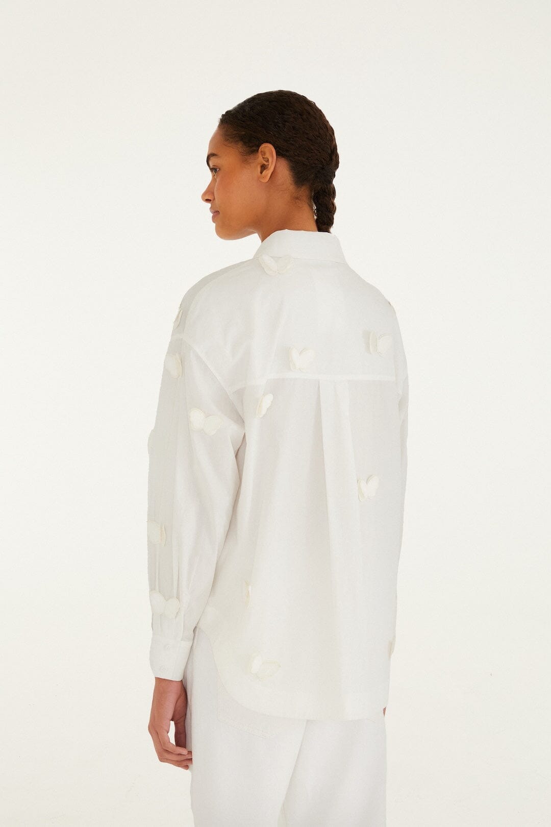 BLUSE MIT SCHMETTERLINGSMUSTER IN OFF-WHITE