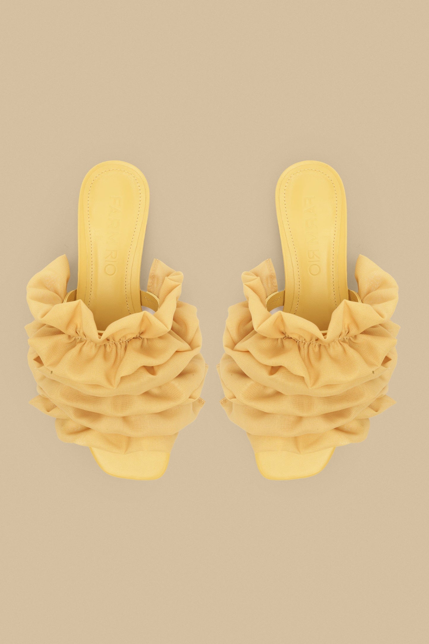 SANDALE PLATE À VOLANTS AU BABEURRE