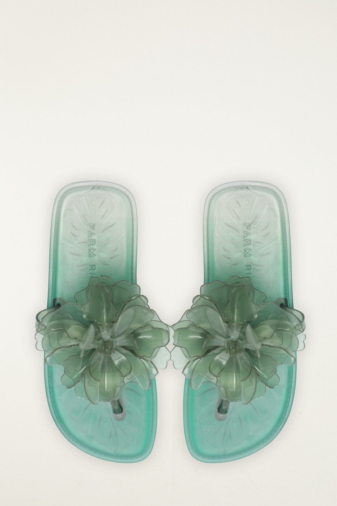 Sandale plate en gelée à fleurs vertes
