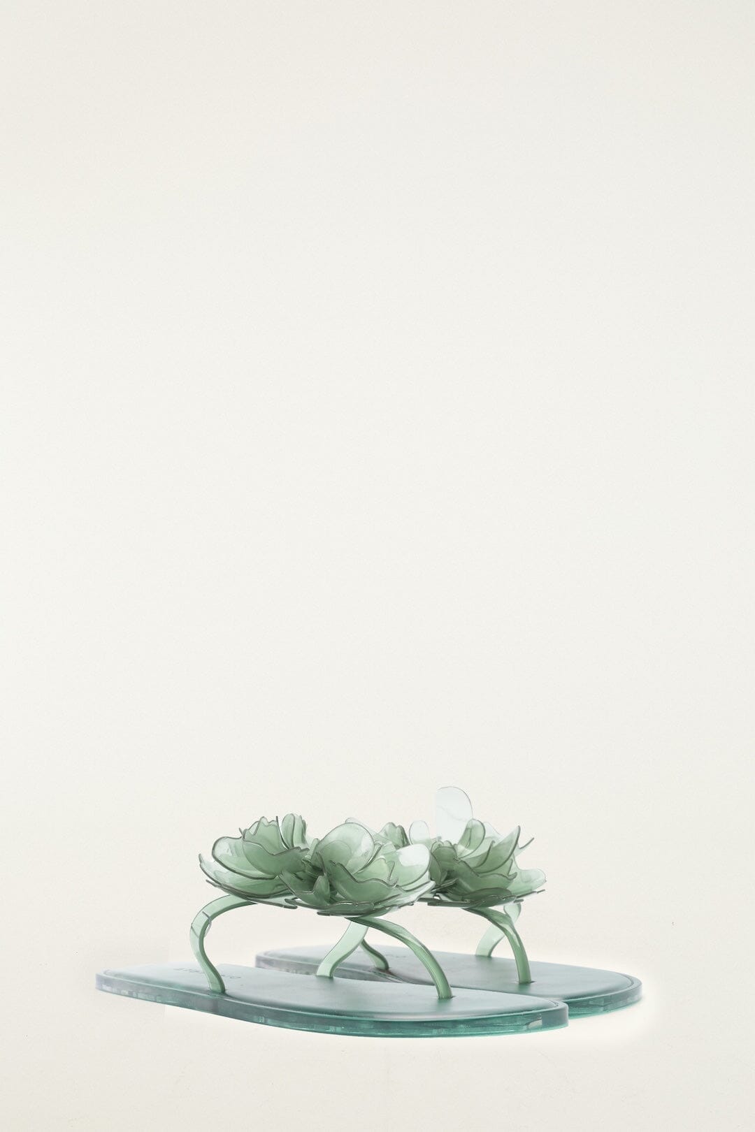 Sandale plate en gelée à fleurs vertes