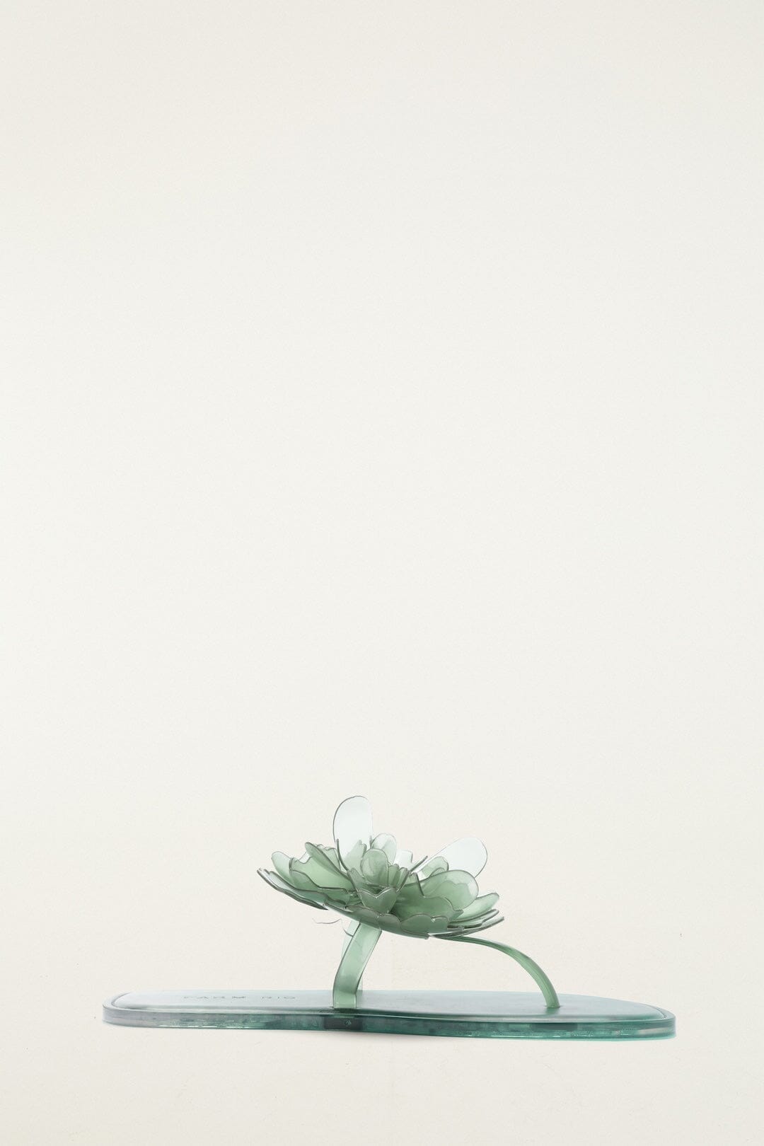 Sandale plate en gelée à fleurs vertes