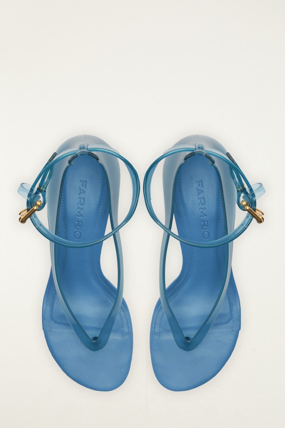 Sandales à talon bleu gelée