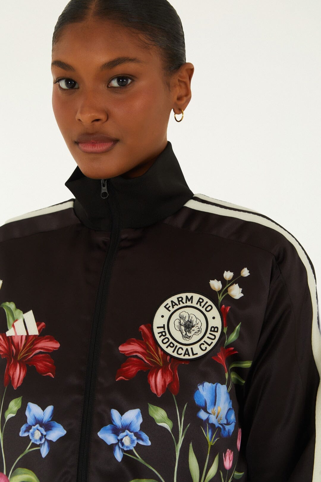 Giacca sportiva Adidas nera con motivo floreale Ainika