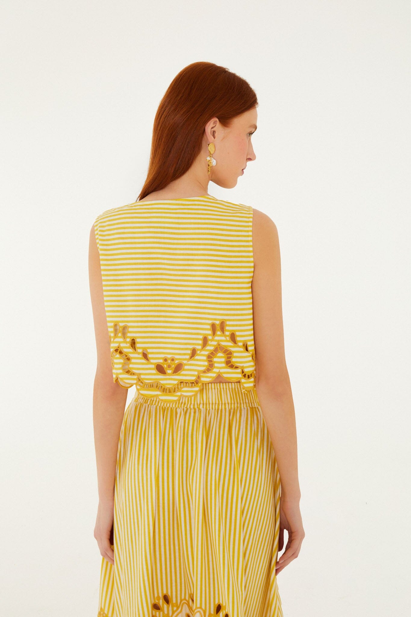 FARM Rio model wearing the Bicolor Stripes Richelieu Sleeveless Lenzing Ecovero Euroflax Crop Top