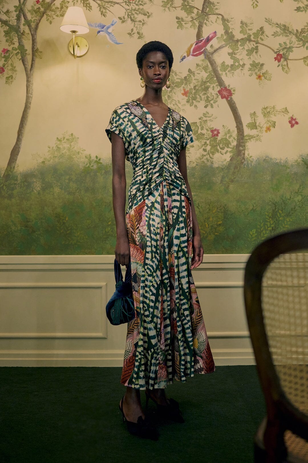FARM Rio model wearing the Birds And Striped Leaves Embroidered Maxi Dress