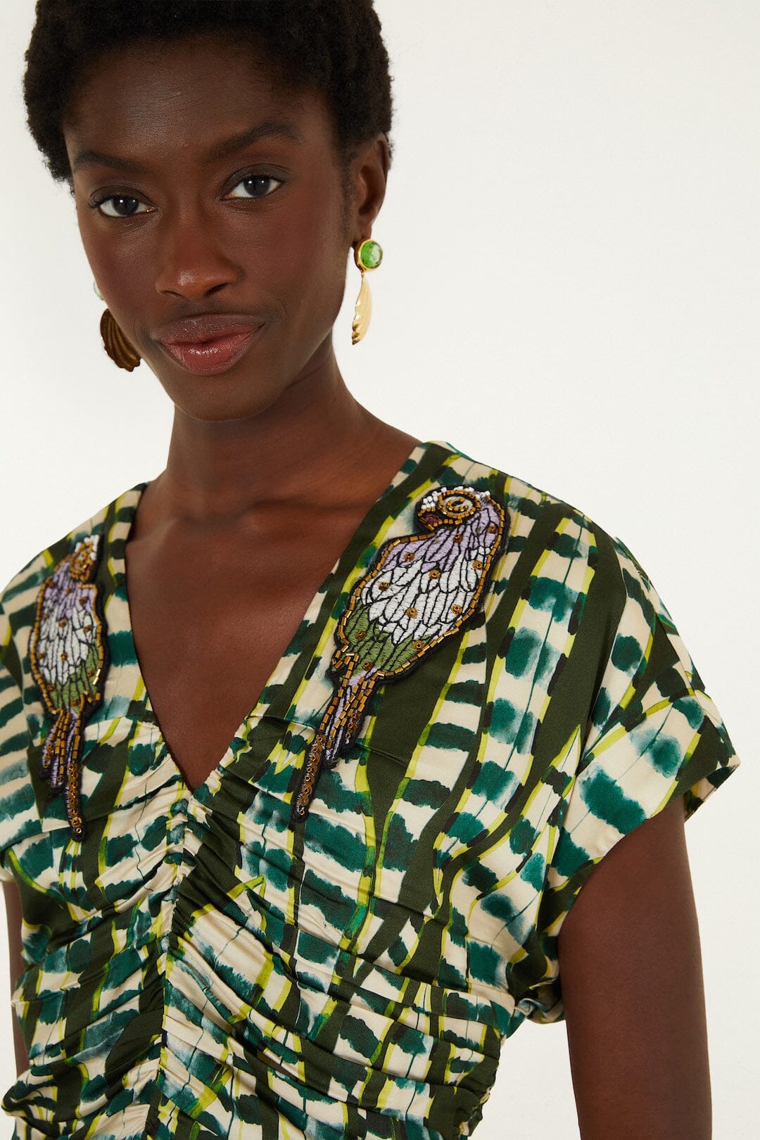 FARM Rio model wearing the Birds And Striped Leaves Embroidered Maxi Dress