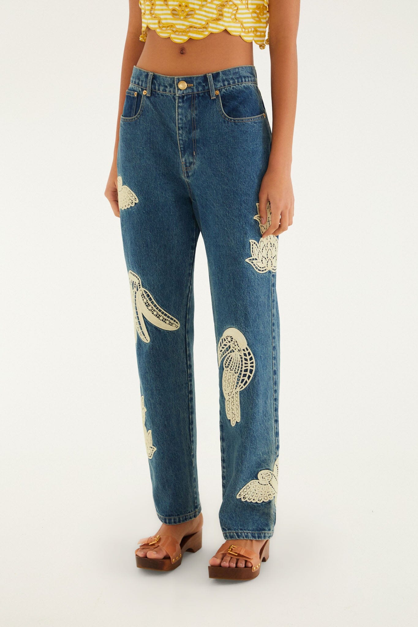 FARM Rio model wearing the Birds Artesanal Pants Jeans