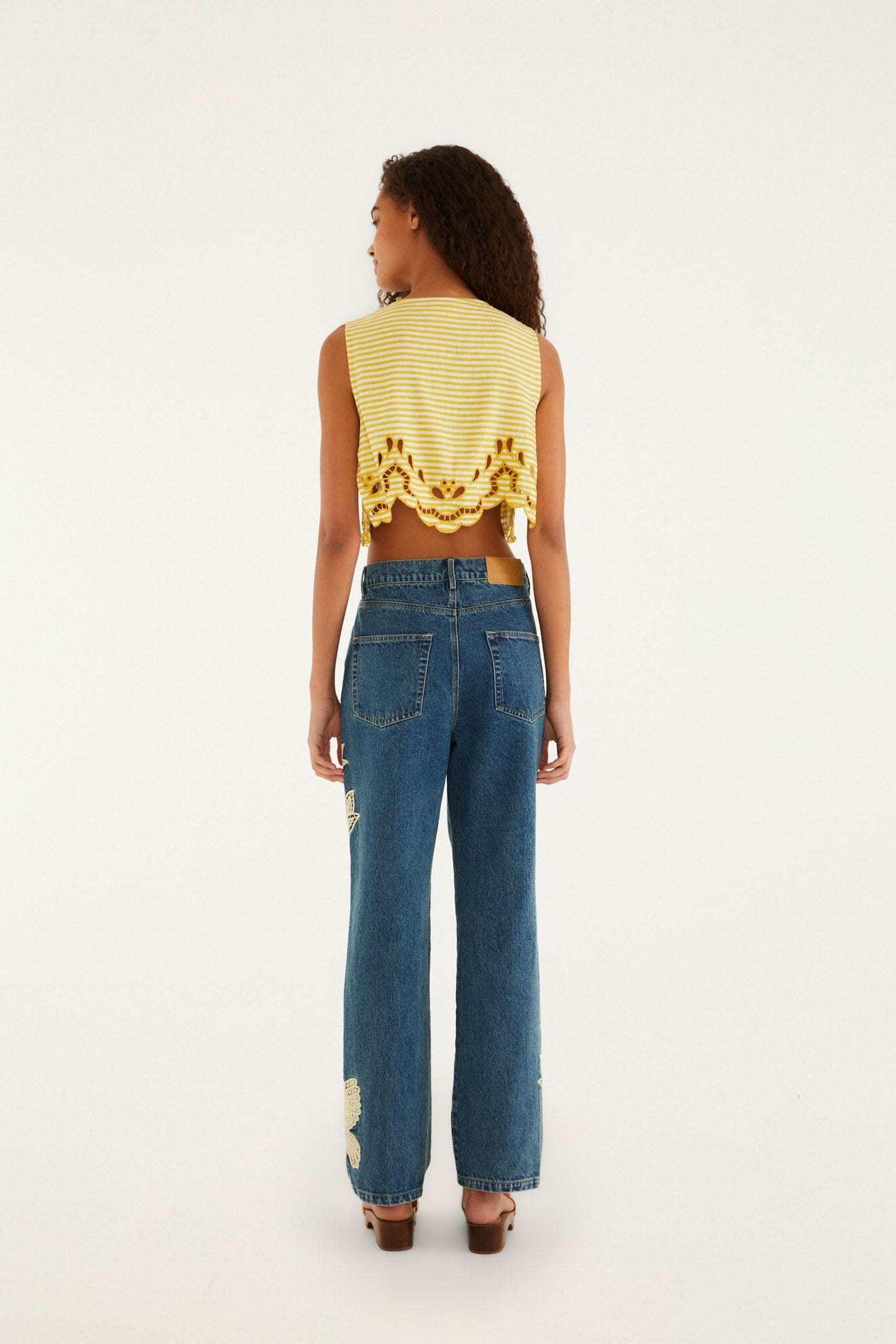 FARM Rio model wearing the Birds Artesanal Pants Jeans