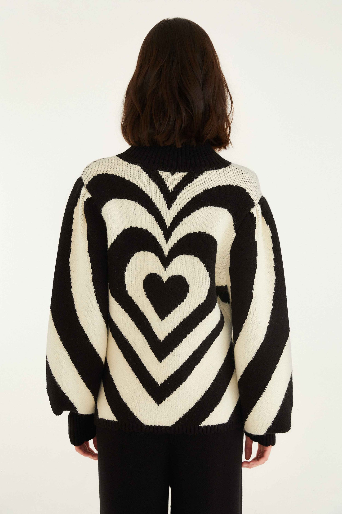 FARM Rio model wearing the Black And White Heart Gradient Knit Sweater