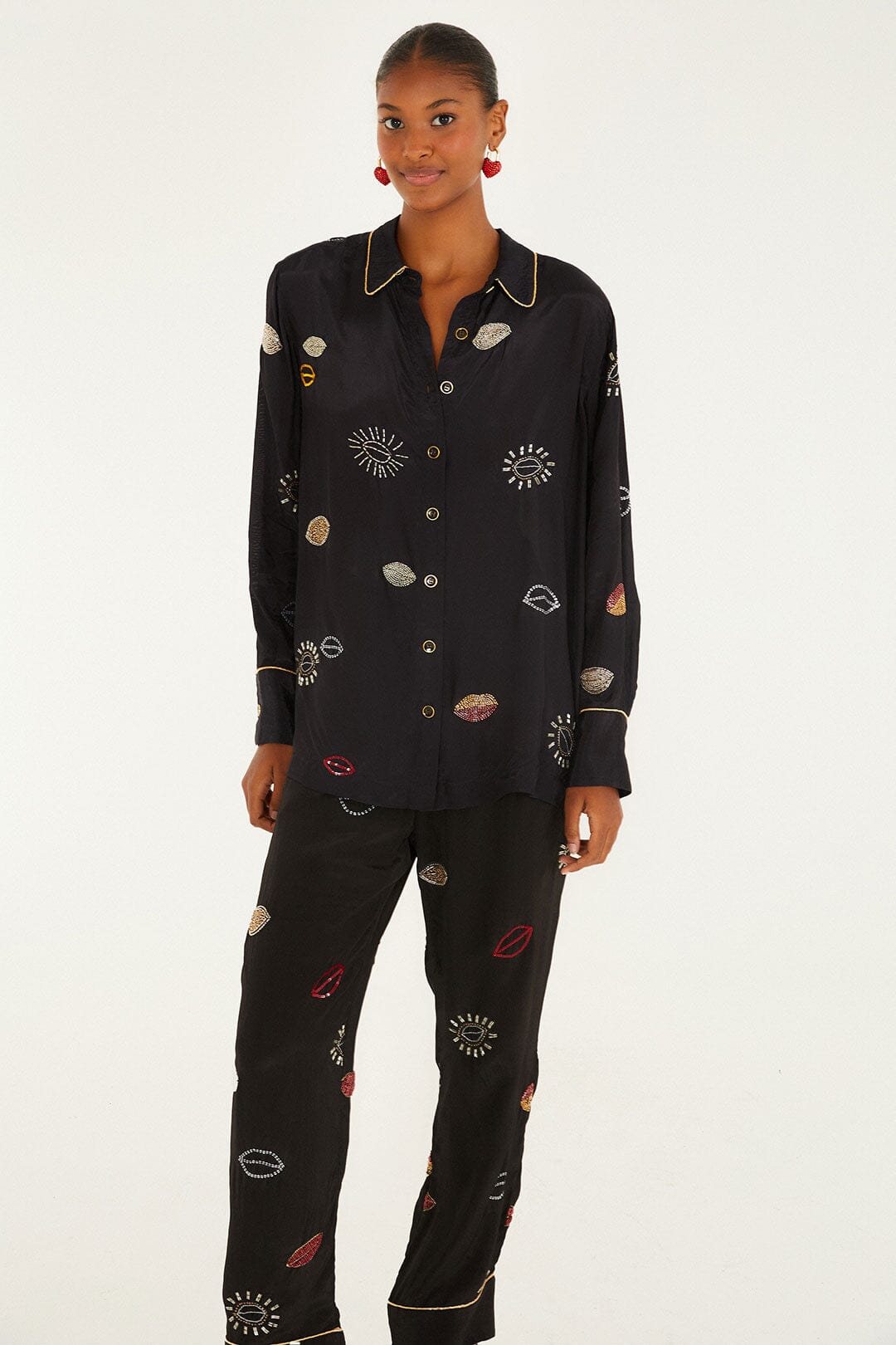 FARM Rio model wearing the Black Beaded Kisses Side Pockets Pajama Pants