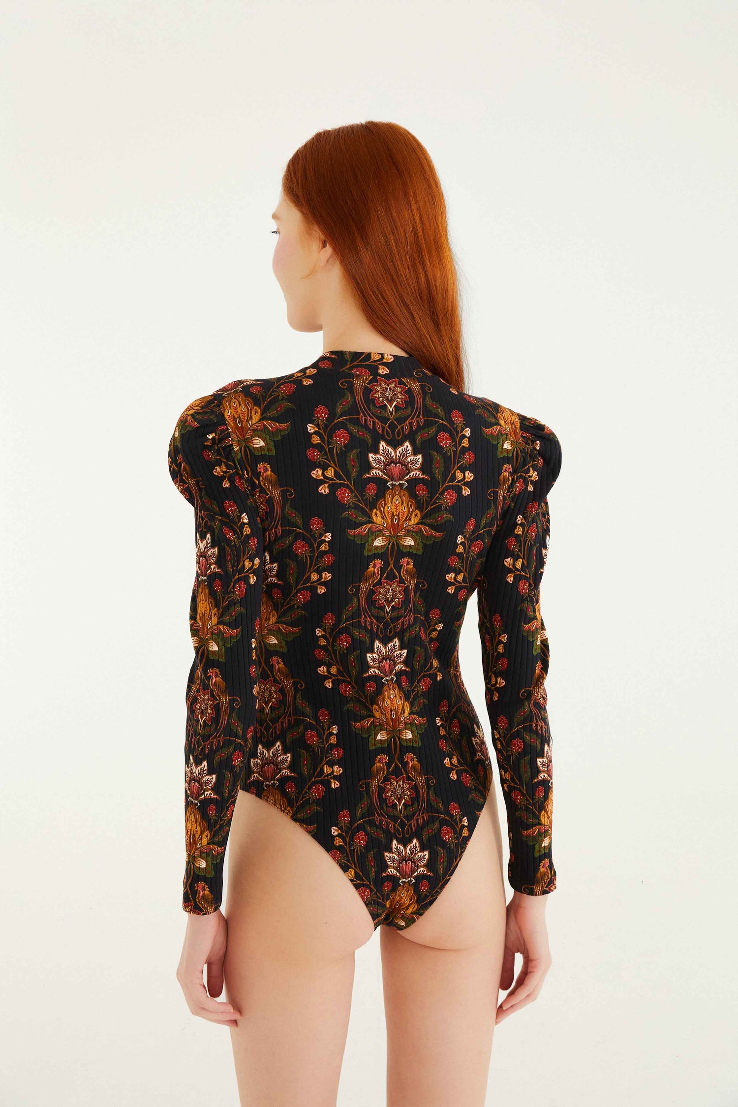 FARM Rio model wearing the Black Berry Garden Organic Cotton Bodysuit