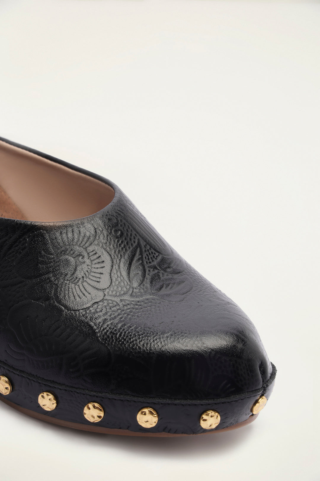 FARM Rio model wearing the Black Embossed Wedge Clog