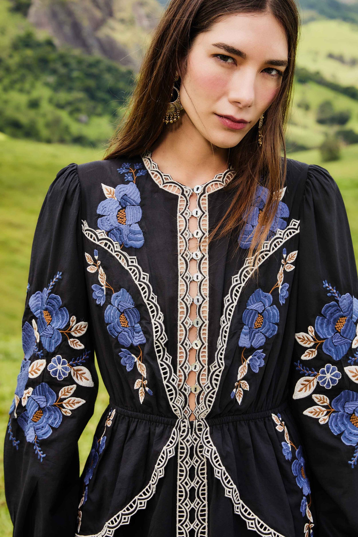 FARM Rio model wearing the Black Embroidered Flowers Long Sleeve Midi Dress