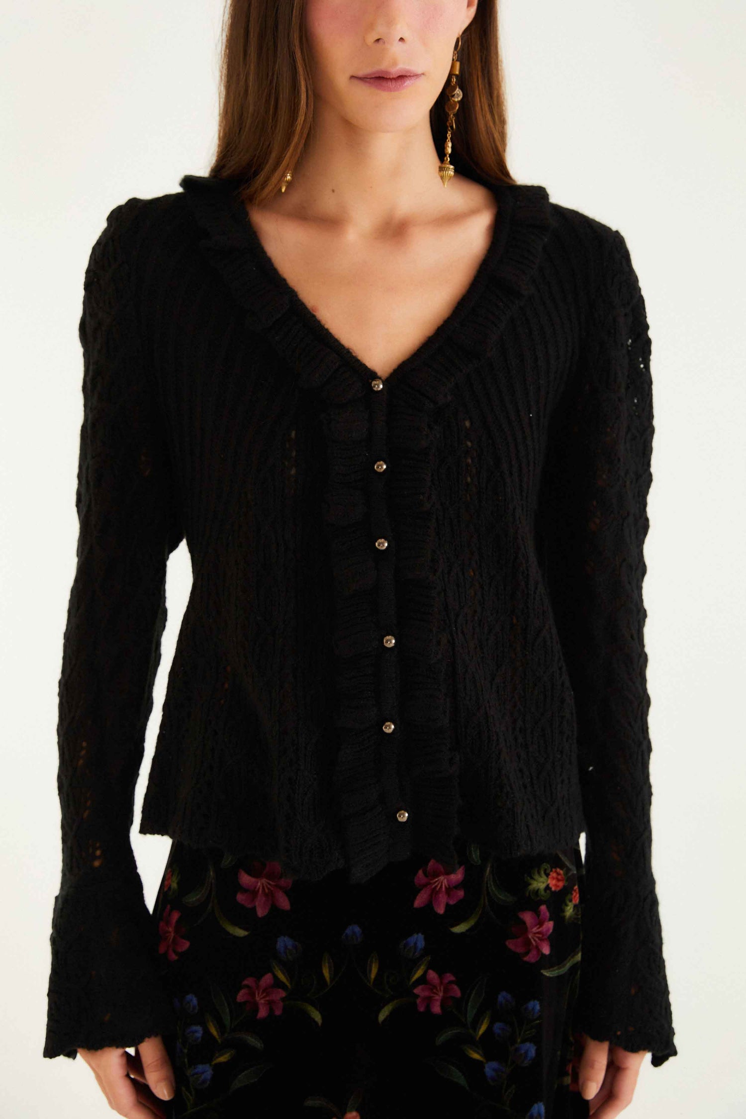 FARM Rio model wearing the Black Lace Ruffled Knit Cardigan