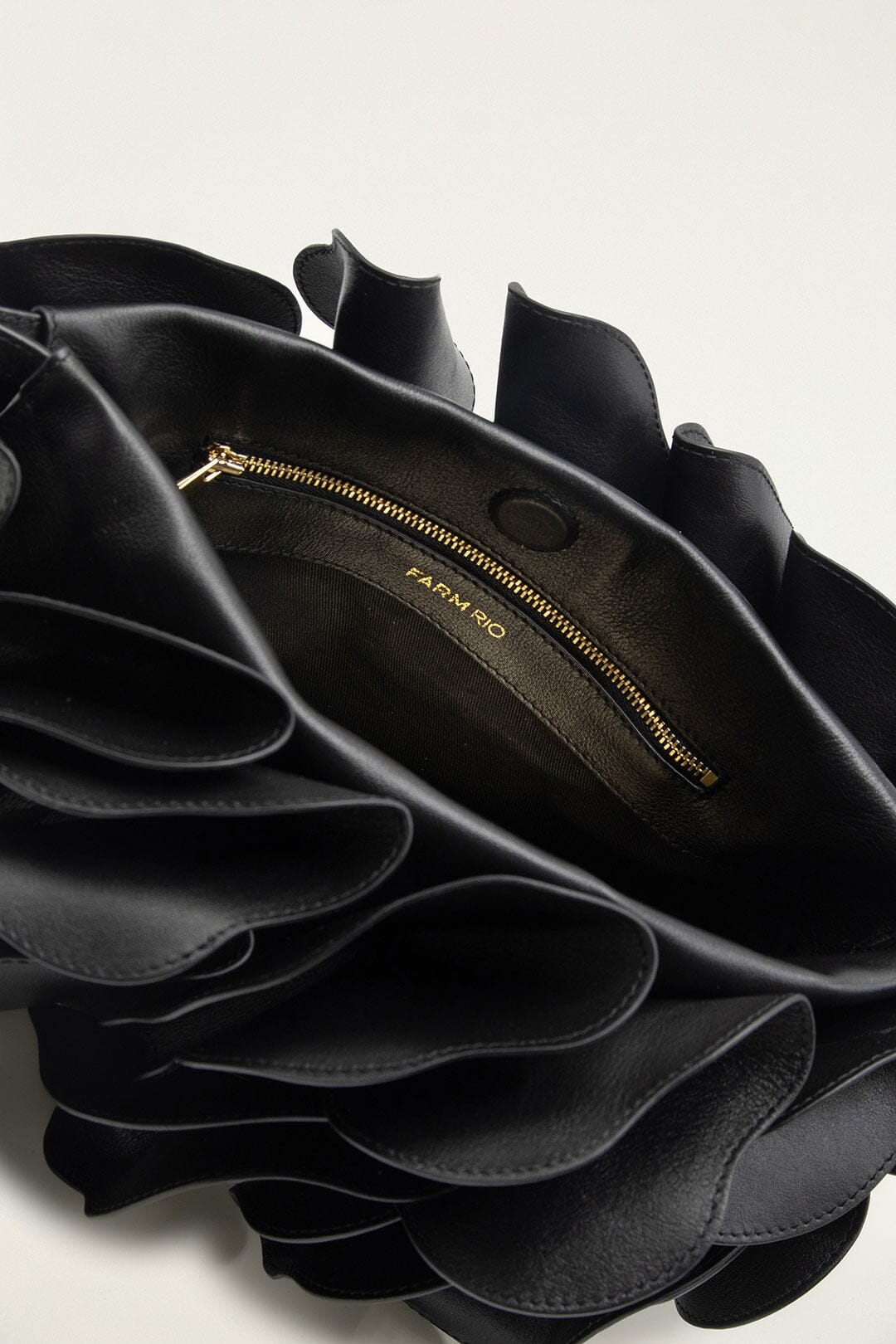 FARM Rio model wearing the Black Leather Shoulder Flower Bag