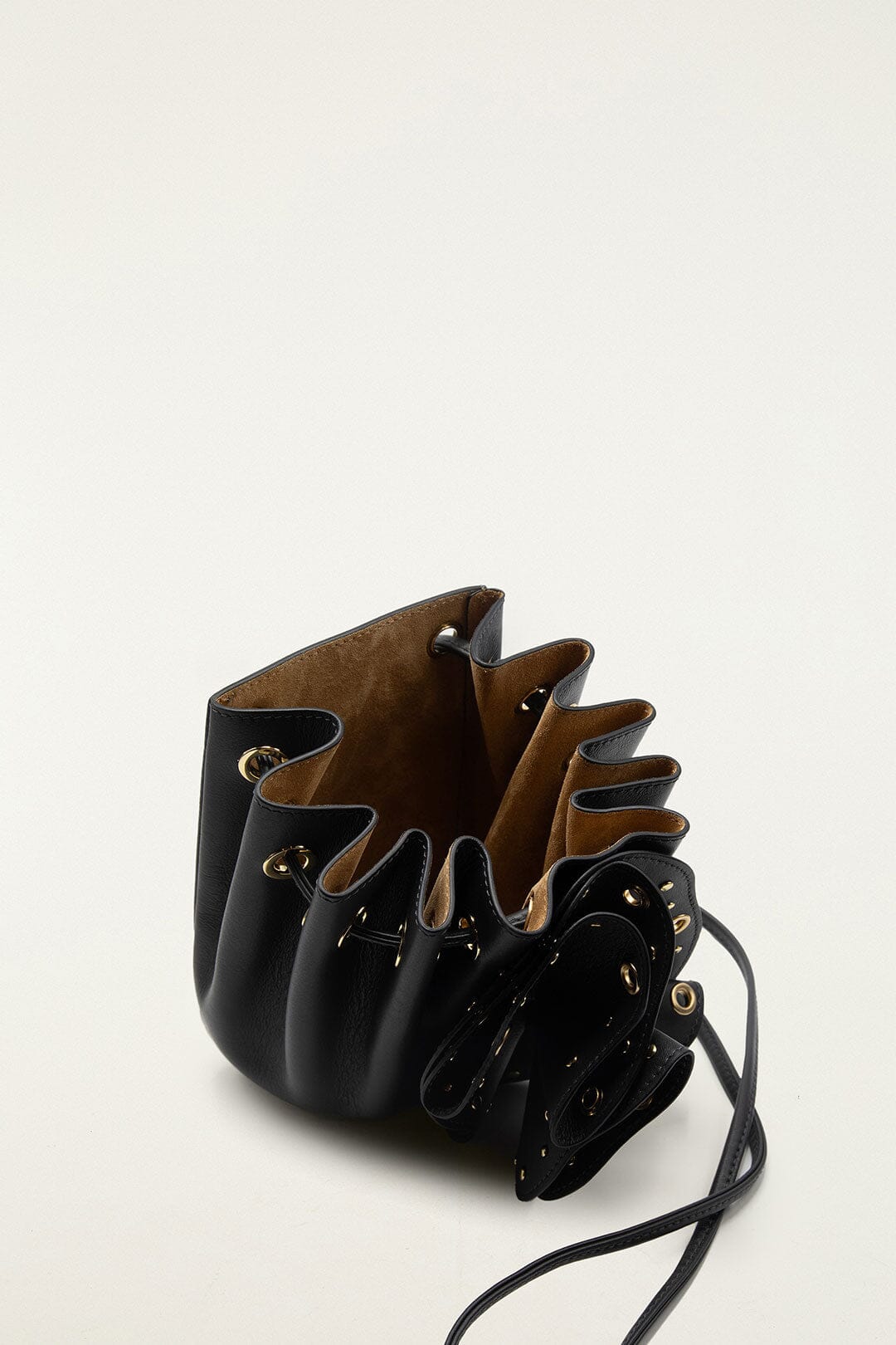 FARM Rio model wearing the Black Leather Studded Crossbody Flower Bag