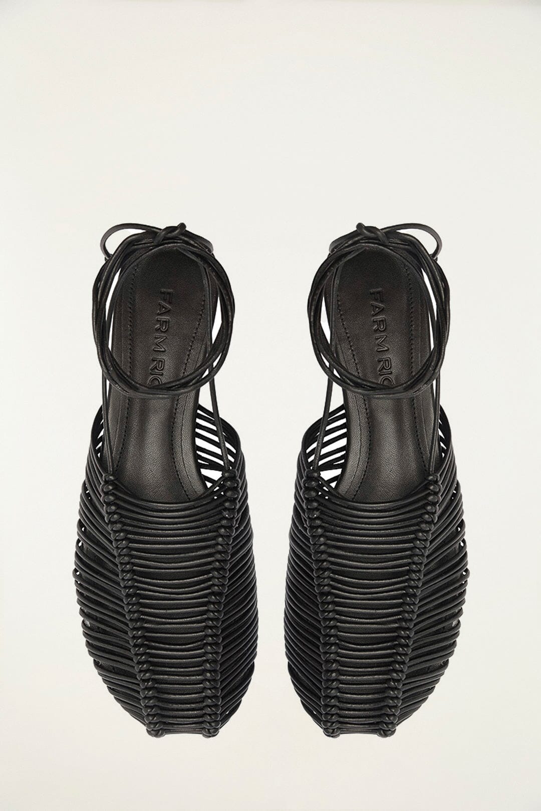 FARM Rio model wearing the Black Macrame Mule