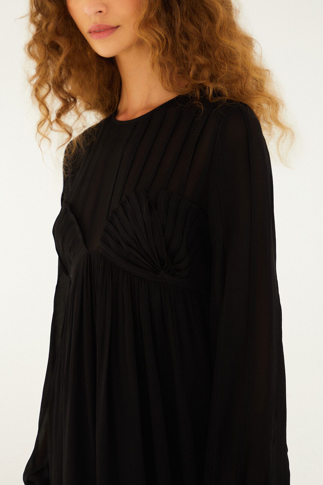 FARM Rio model wearing the Black Shell Mini Dress