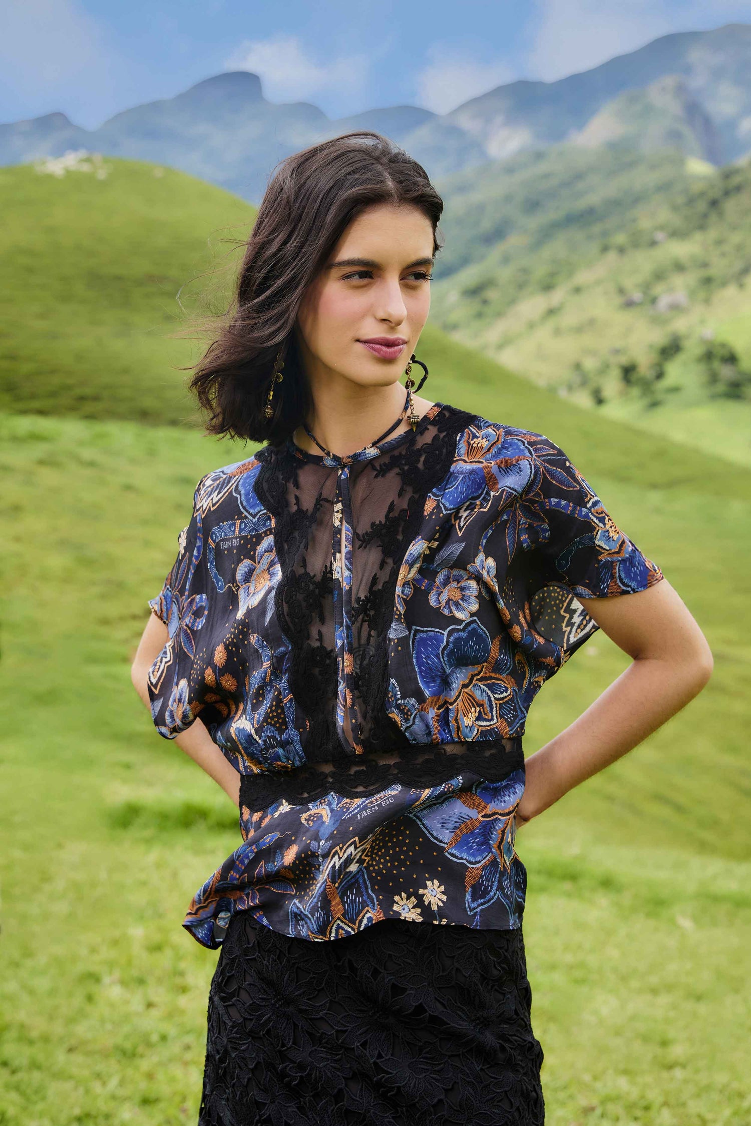 FARM Rio model wearing the Black Snakes Bouquet Blouse