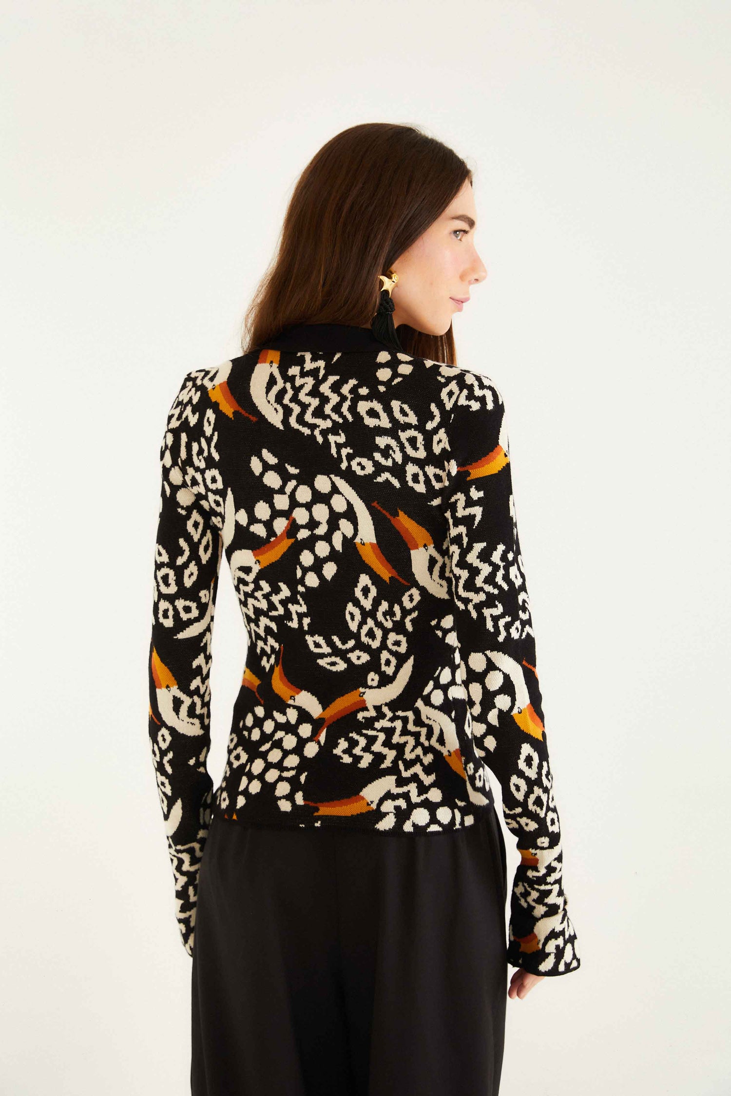 FARM Rio model wearing the Black Tucanissimo Long Sleeve Polo Knit Top