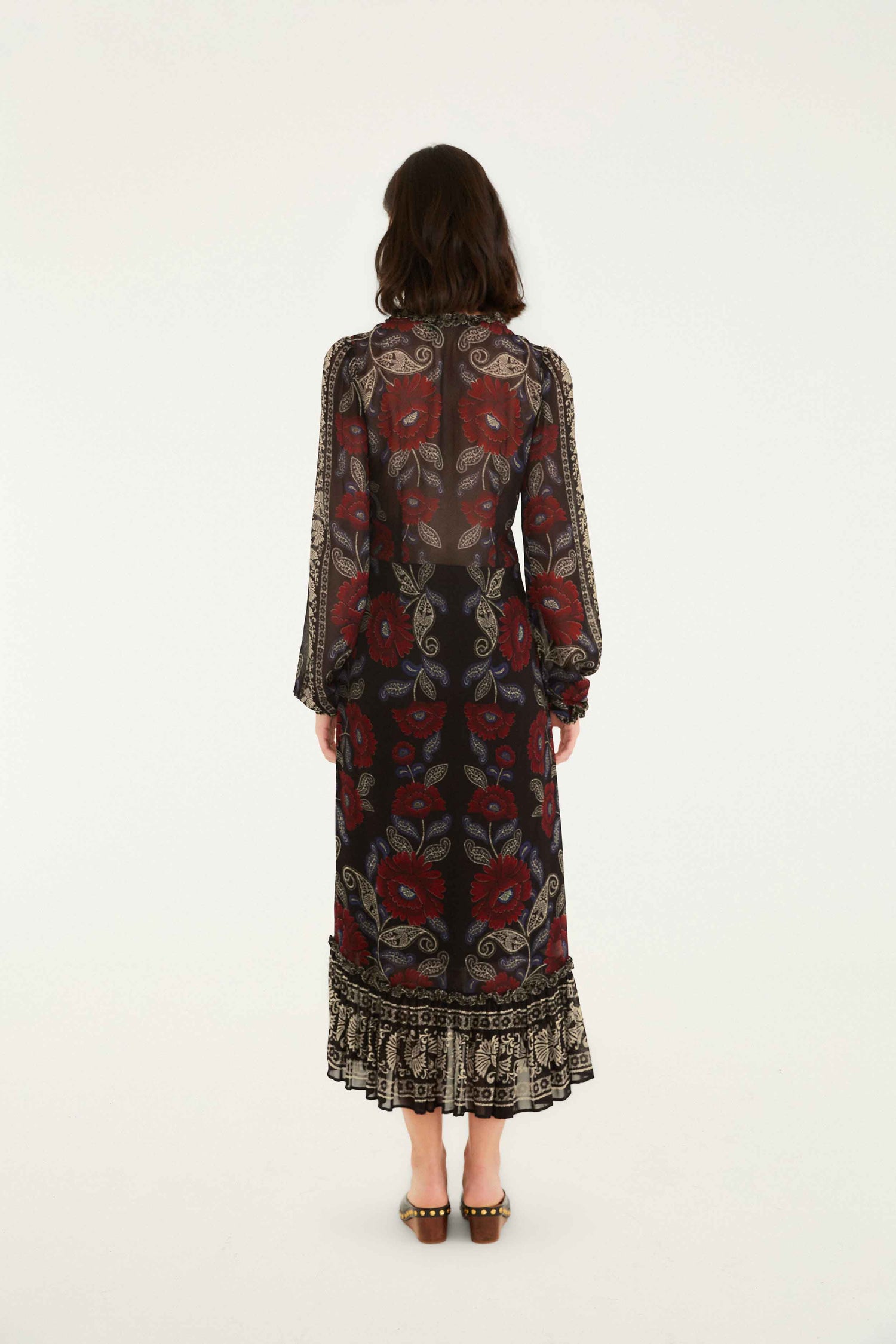 FARM Rio model wearing the Black Valentina Ruffled Long Sleeve Midi Dress