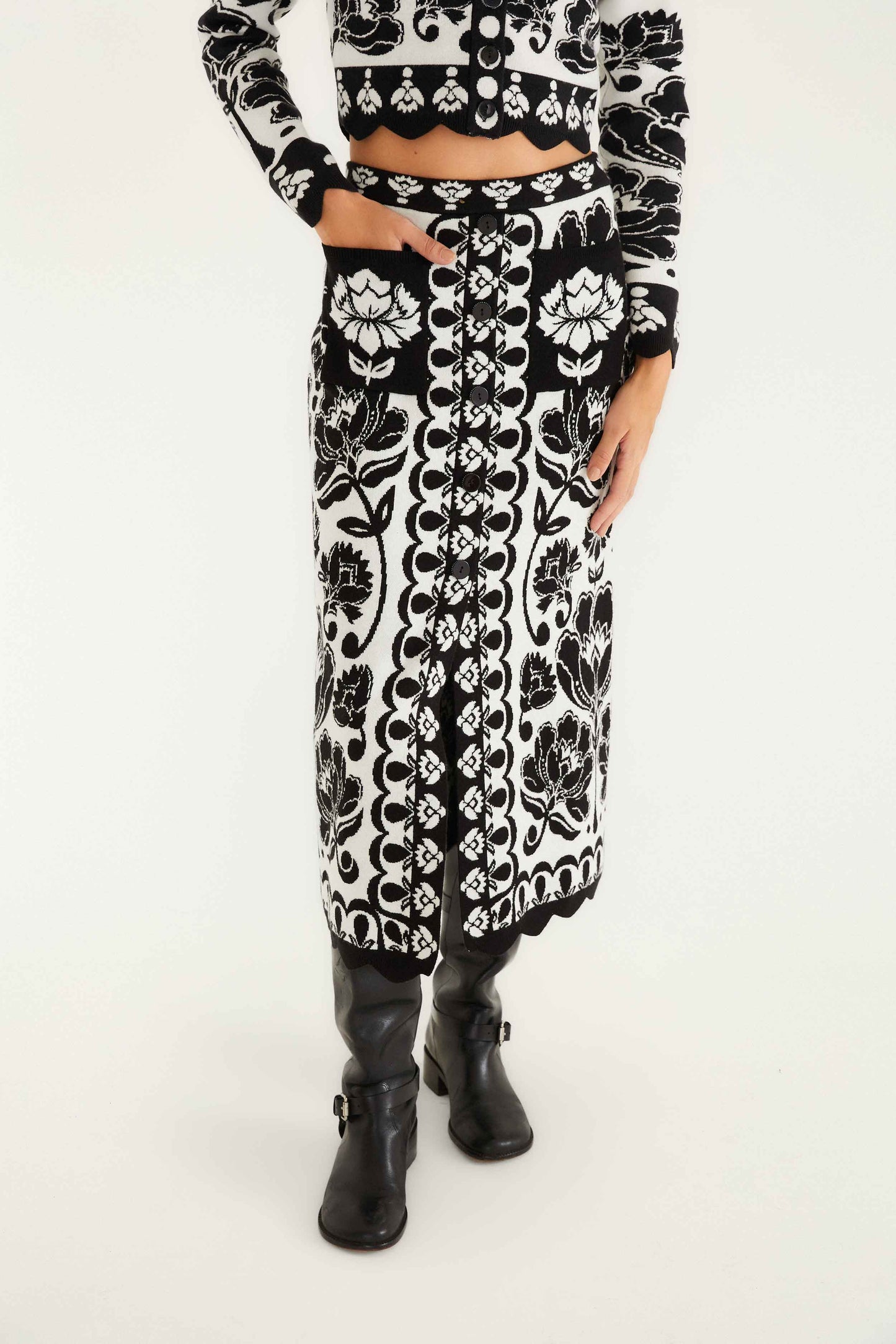 FARM Rio model wearing the Black & White Floral Arabesque Knit Skirt