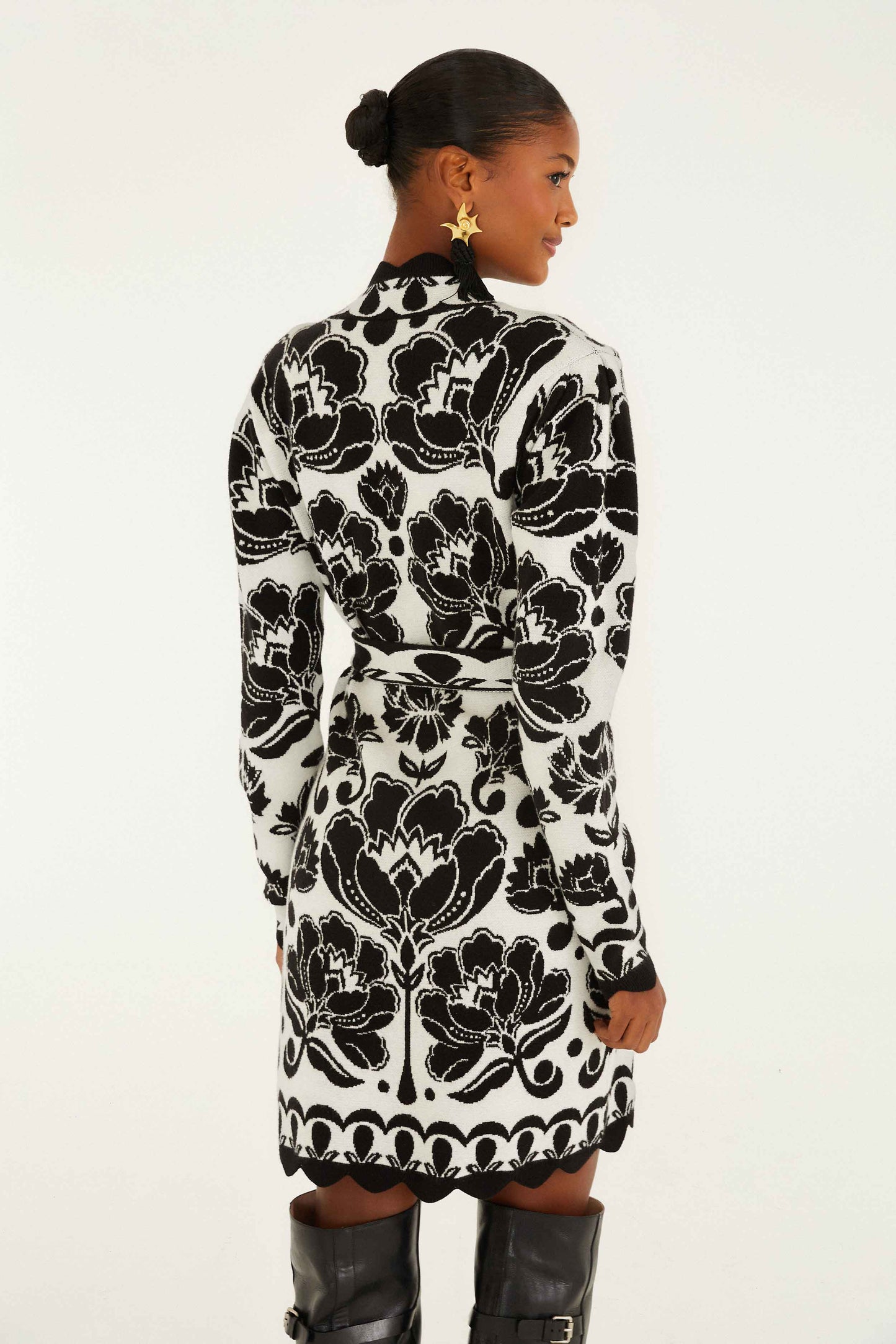 FARM Rio model wearing the Black & White Floral Arabesque Knit Wrap Dress