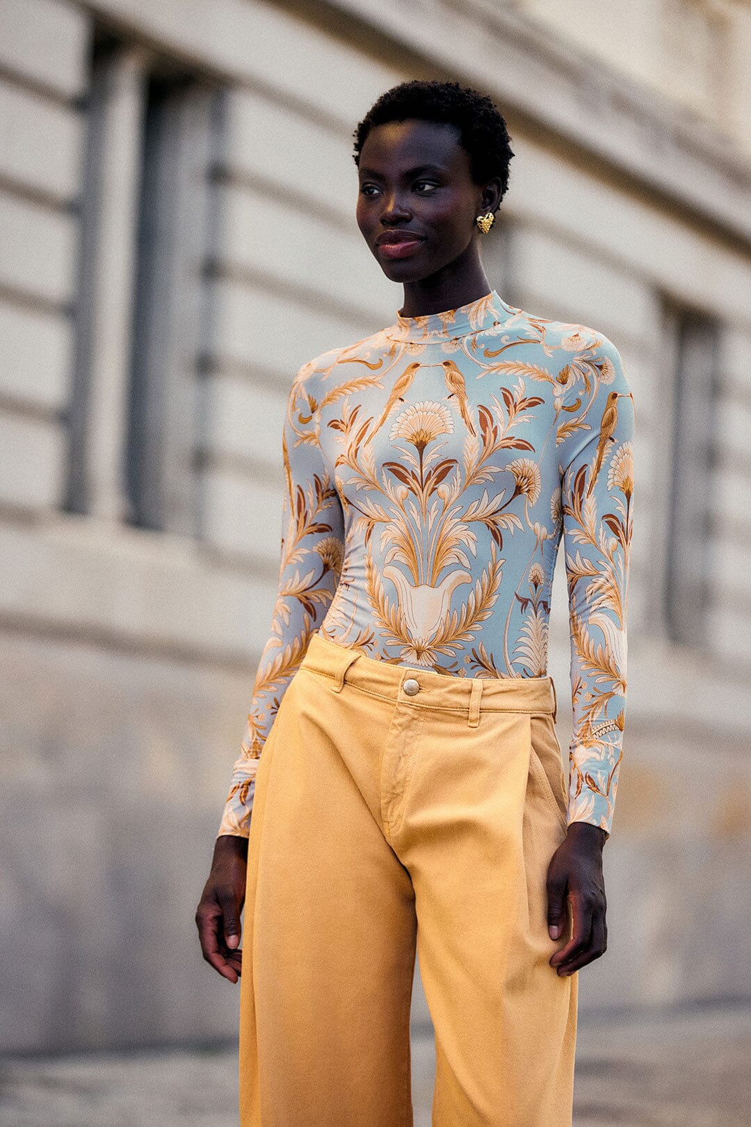 FARM Rio model wearing the Blooming Garden Jersey Blouse