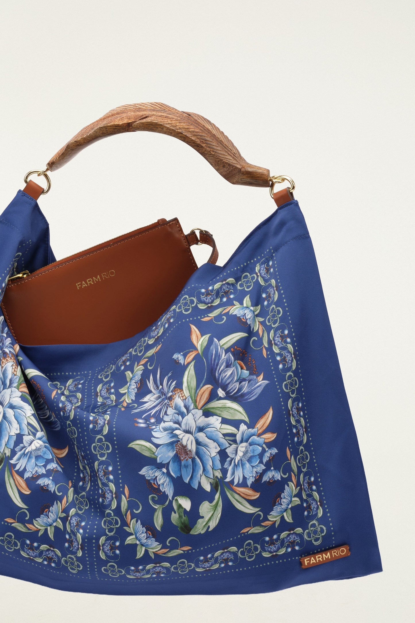 FARM Rio model wearing the Blue Flowers Satin Small Scarf Bag