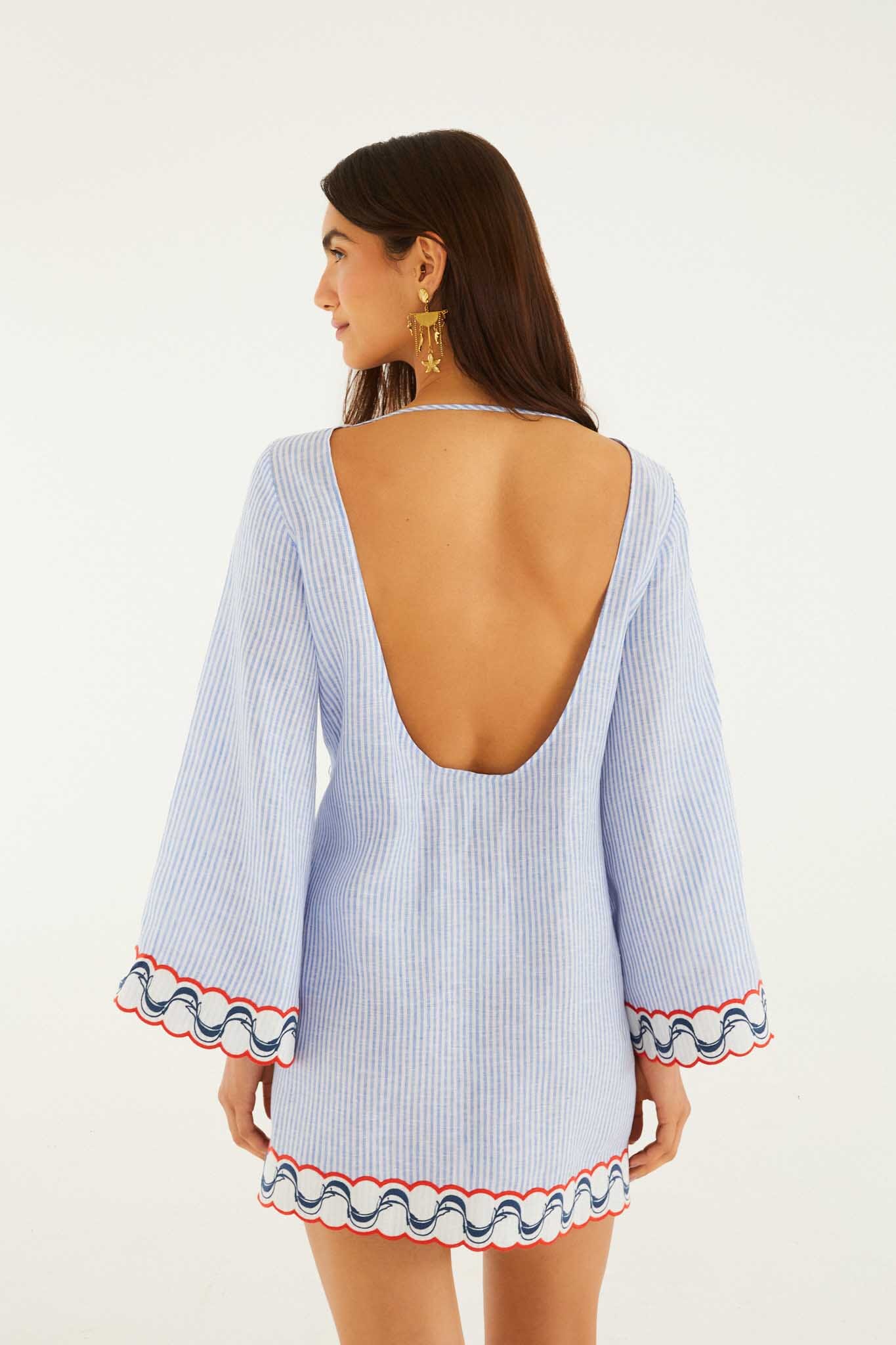 FARM Rio model wearing the Blue Stripes Embroidered Open Back Mini Dress