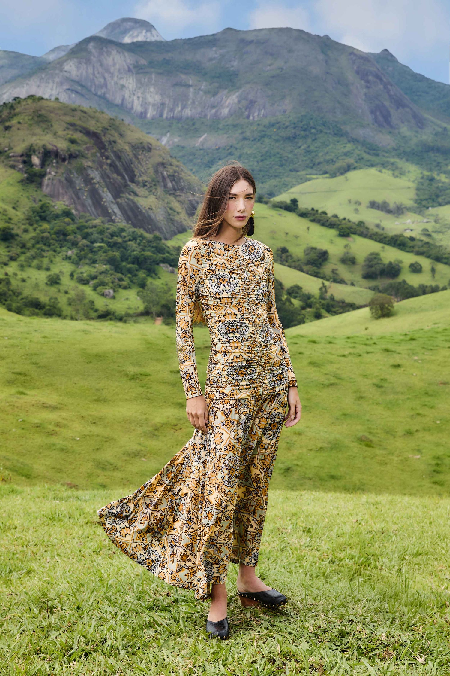 FARM Rio model wearing the Blue Winter Tapestry Long Sleeve Maxi Dress