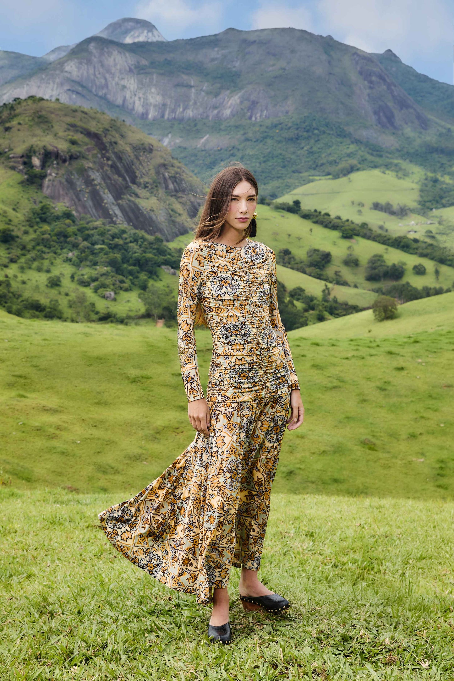 FARM Rio model wearing the Blue Winter Tapestry Long Sleeve Maxi Dress