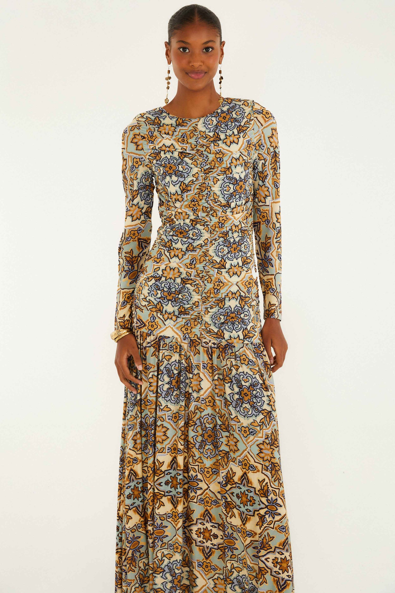 FARM Rio model wearing the Blue Winter Tapestry Long Sleeve Maxi Dress